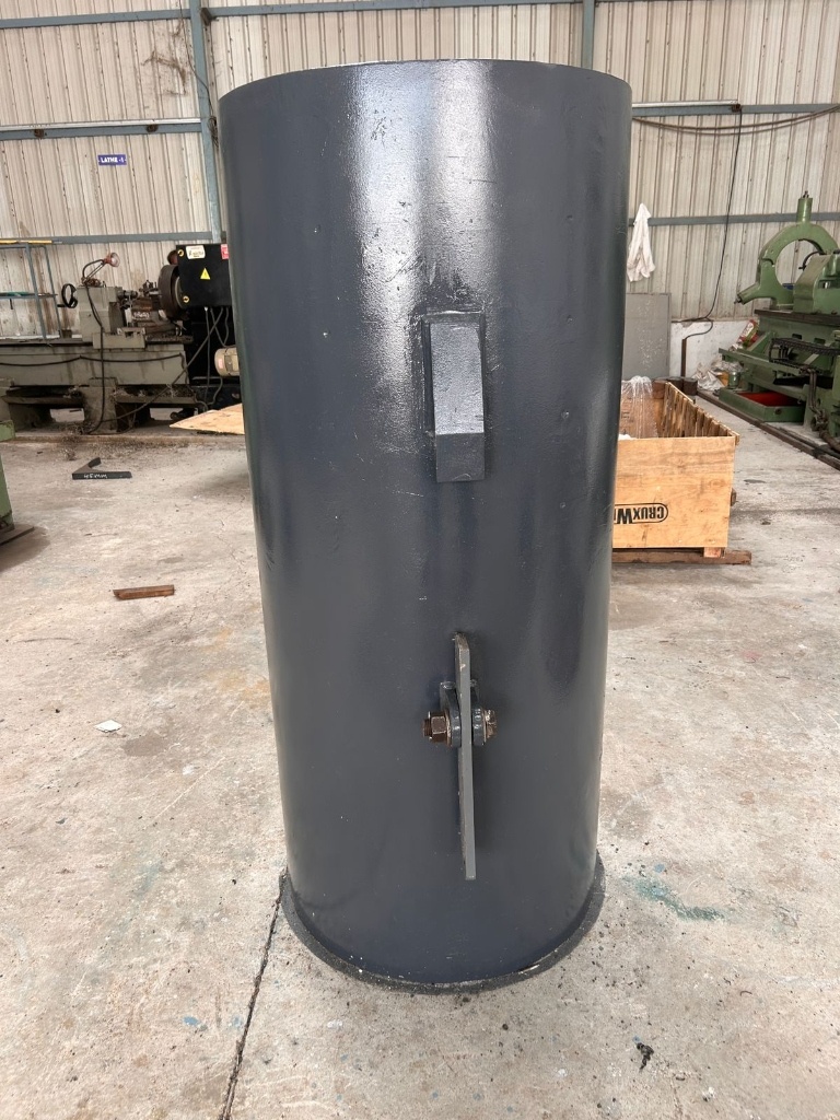 Cylindrical outer steel casing with mounting clevis bracket